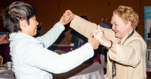 Care partners dancing